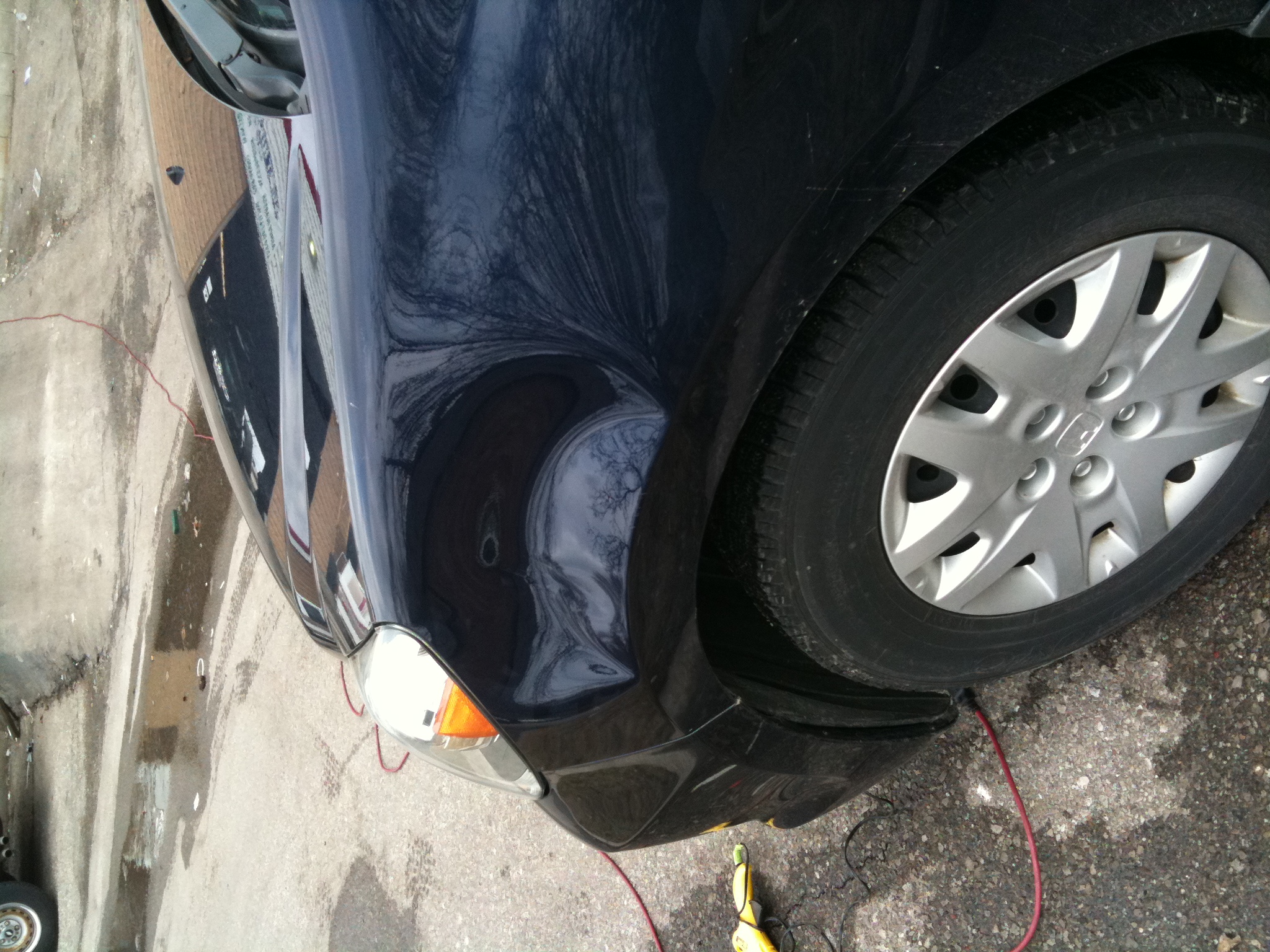 Before round dent in front fender