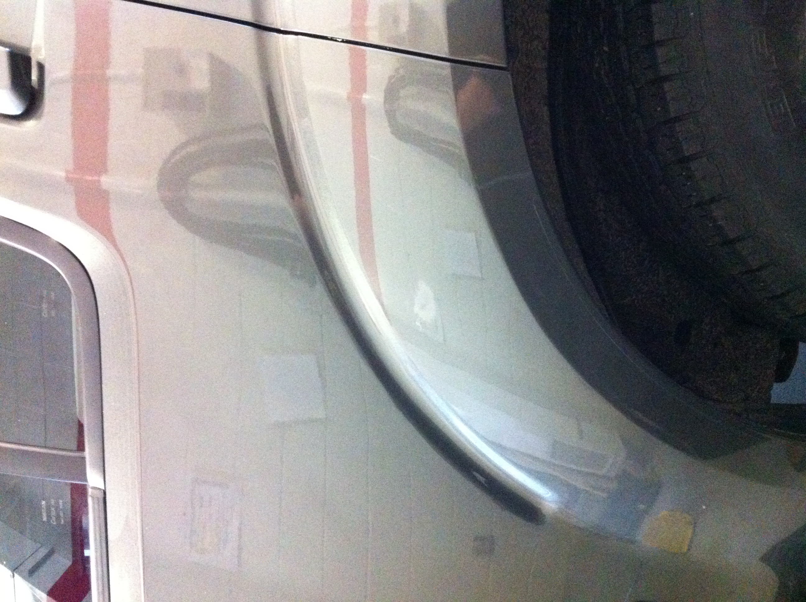 After rear panel distortion near wheel area repair