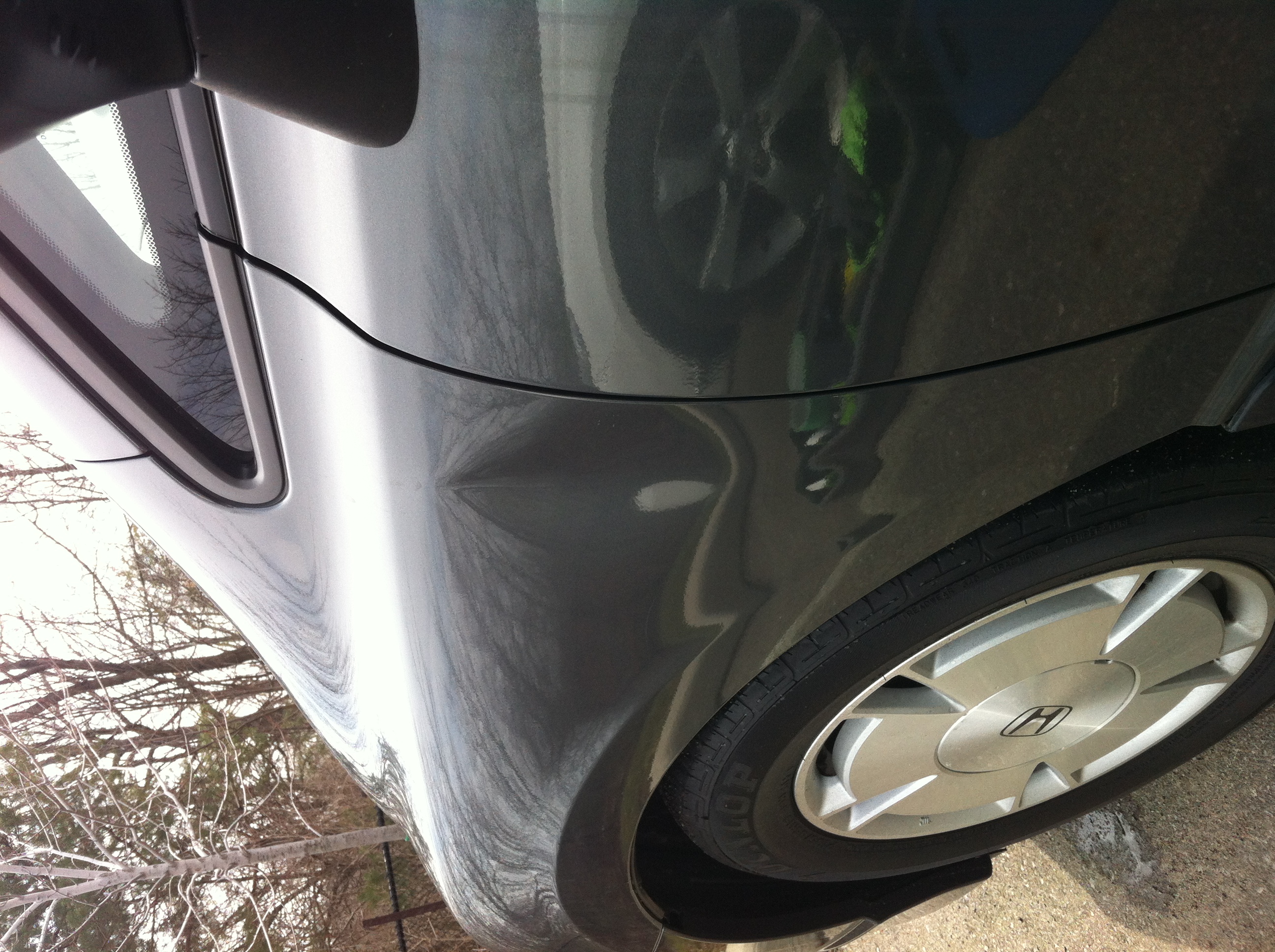 Before major quarter crease around fuel door area