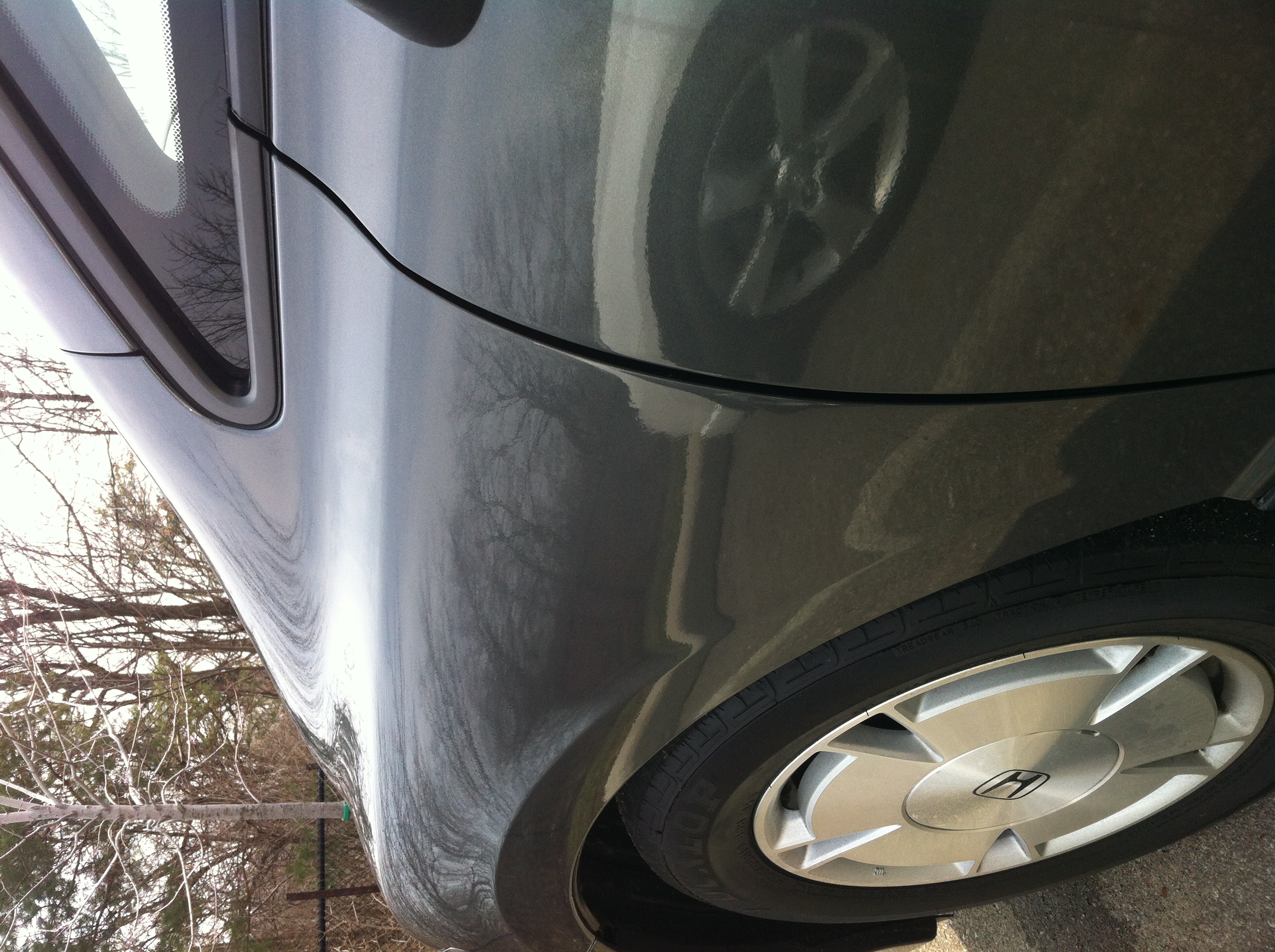 After major quarter crease around fuel door area repair