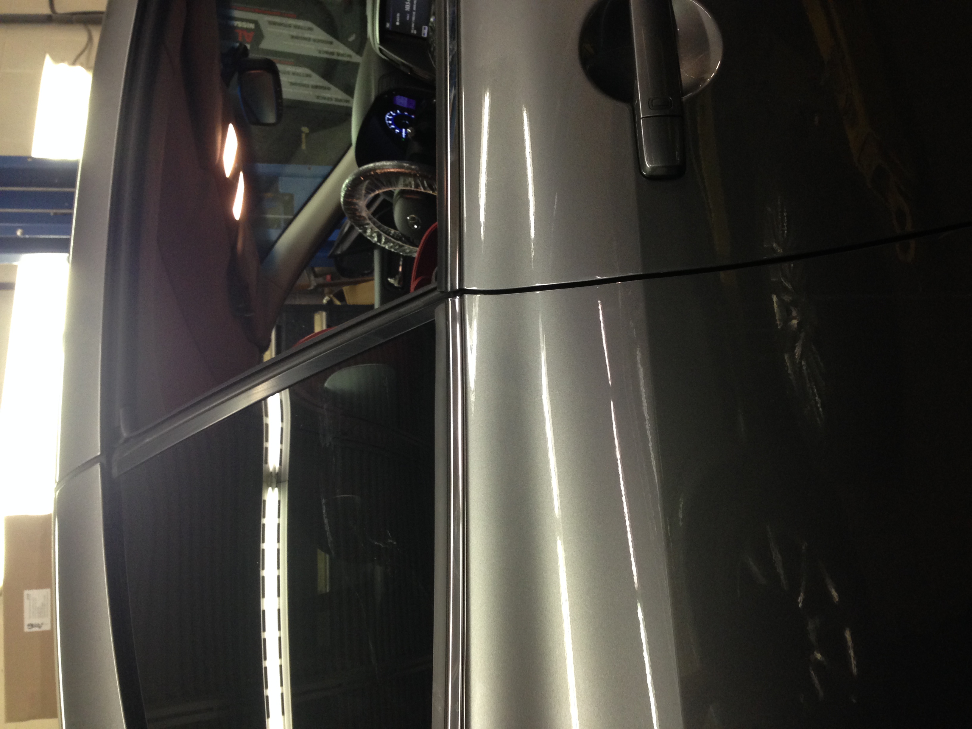 Before front door ding near handle area