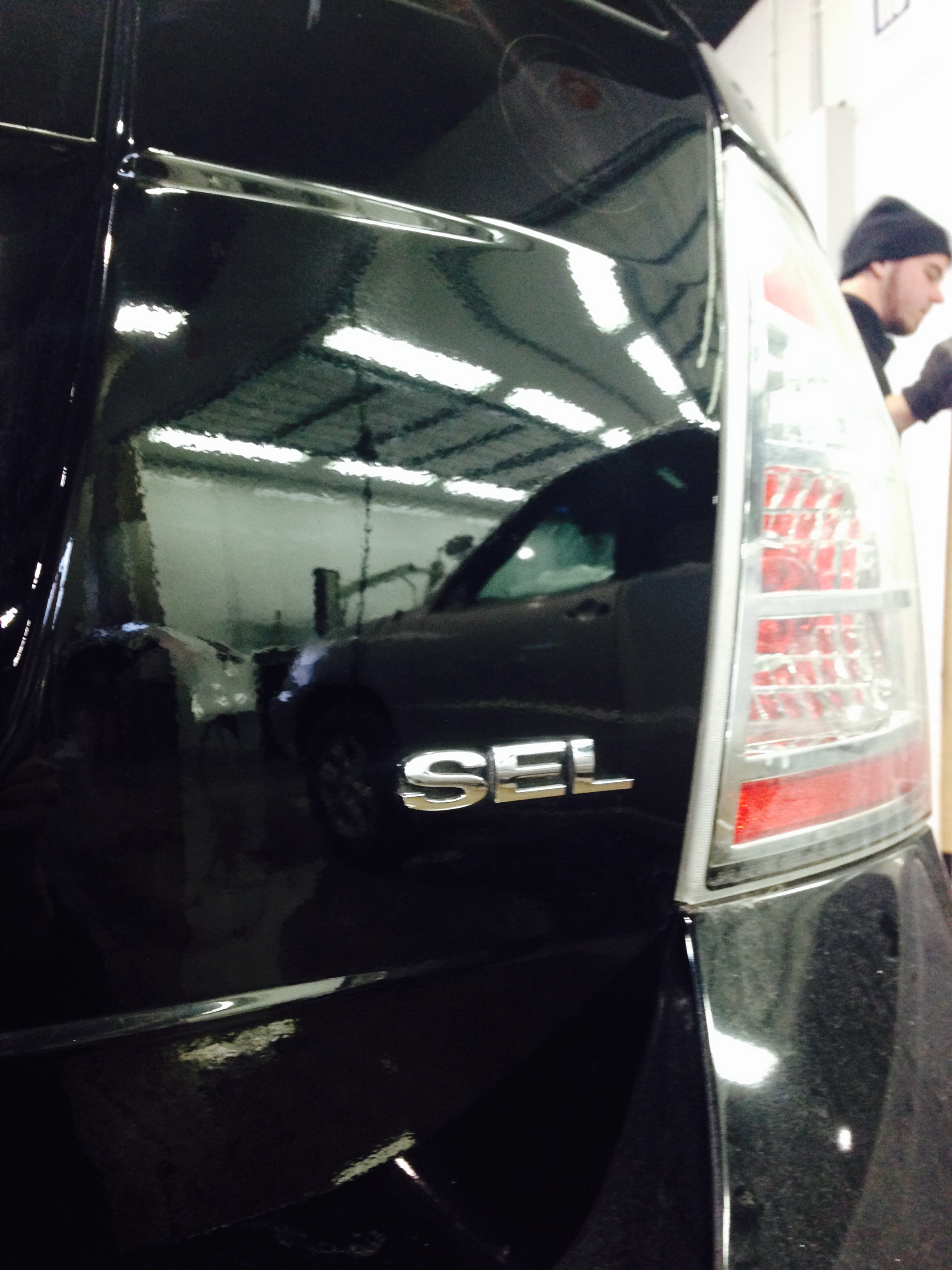 After tailgate dent near SEL badge repair